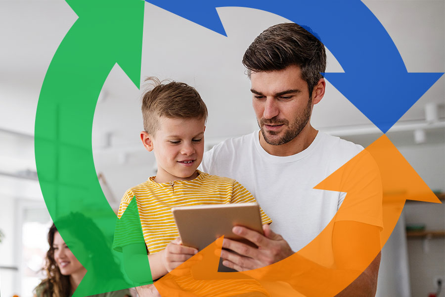 Father and son look at tablet together with Conexon icon around them for thumbnail.