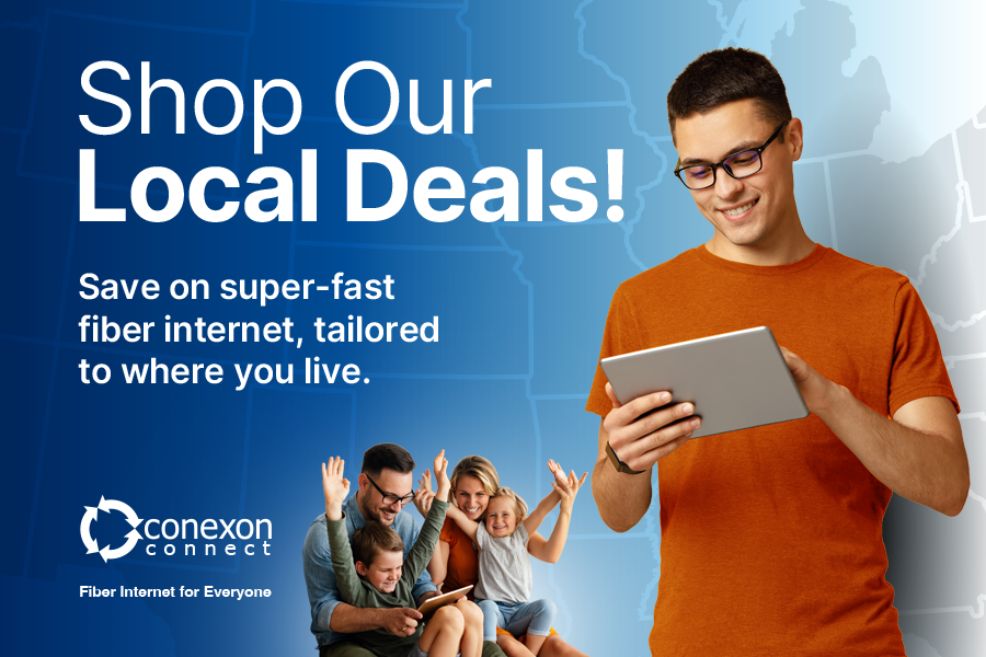 Man smiles and holds a tablet while a family behind him cheer while also looking at a tablet. Text for shop our latest deals and saving on super fast fiber internet.